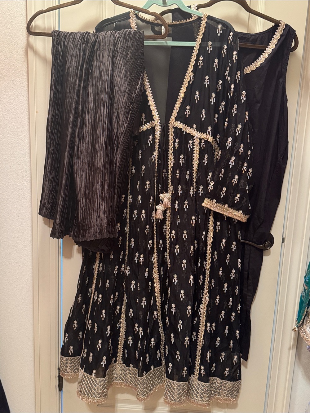 Black organza Embroidered Tie-Front dress. Comes with black crushed pants. 3 pcs